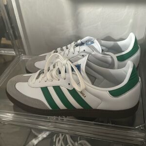 Green , gray and white adidas sambas